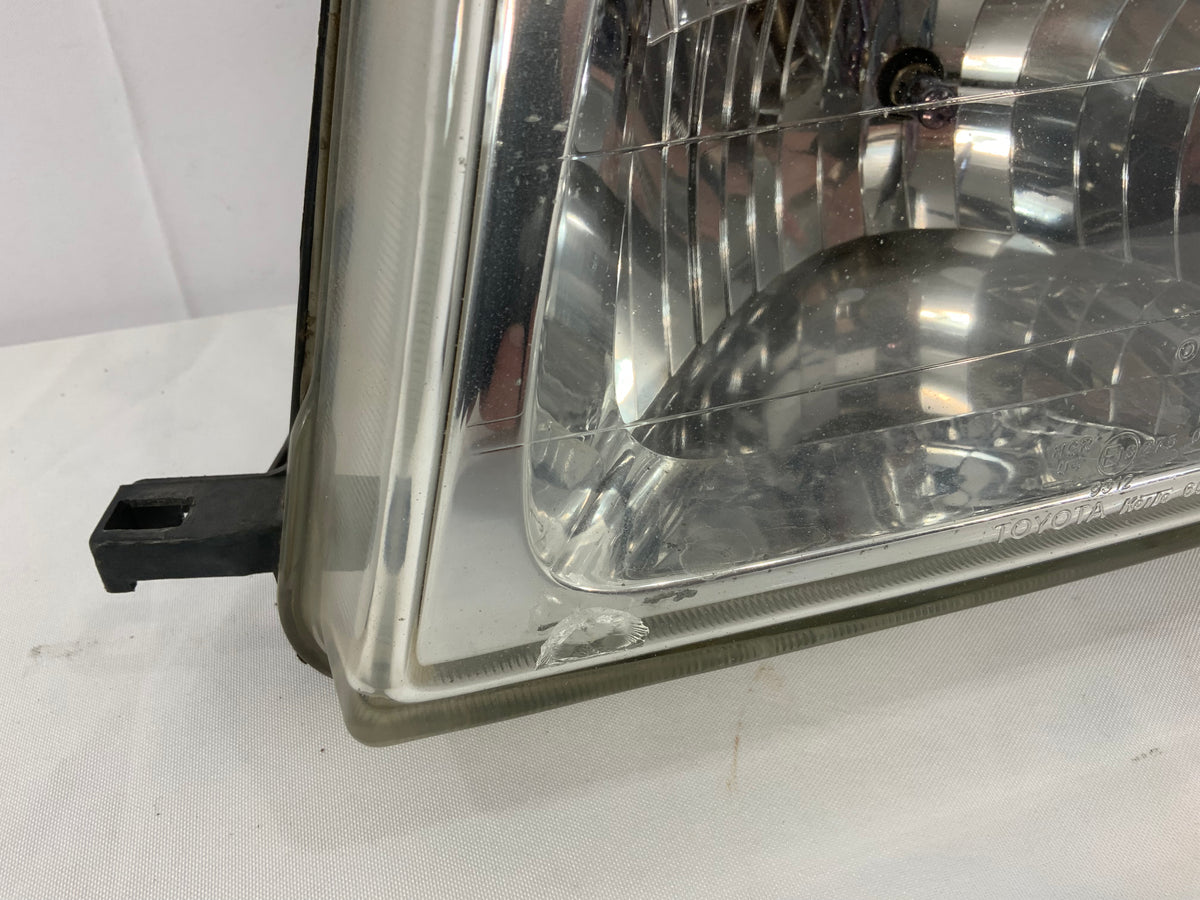 Used - Left Head Light - 100 Series 1998-2005