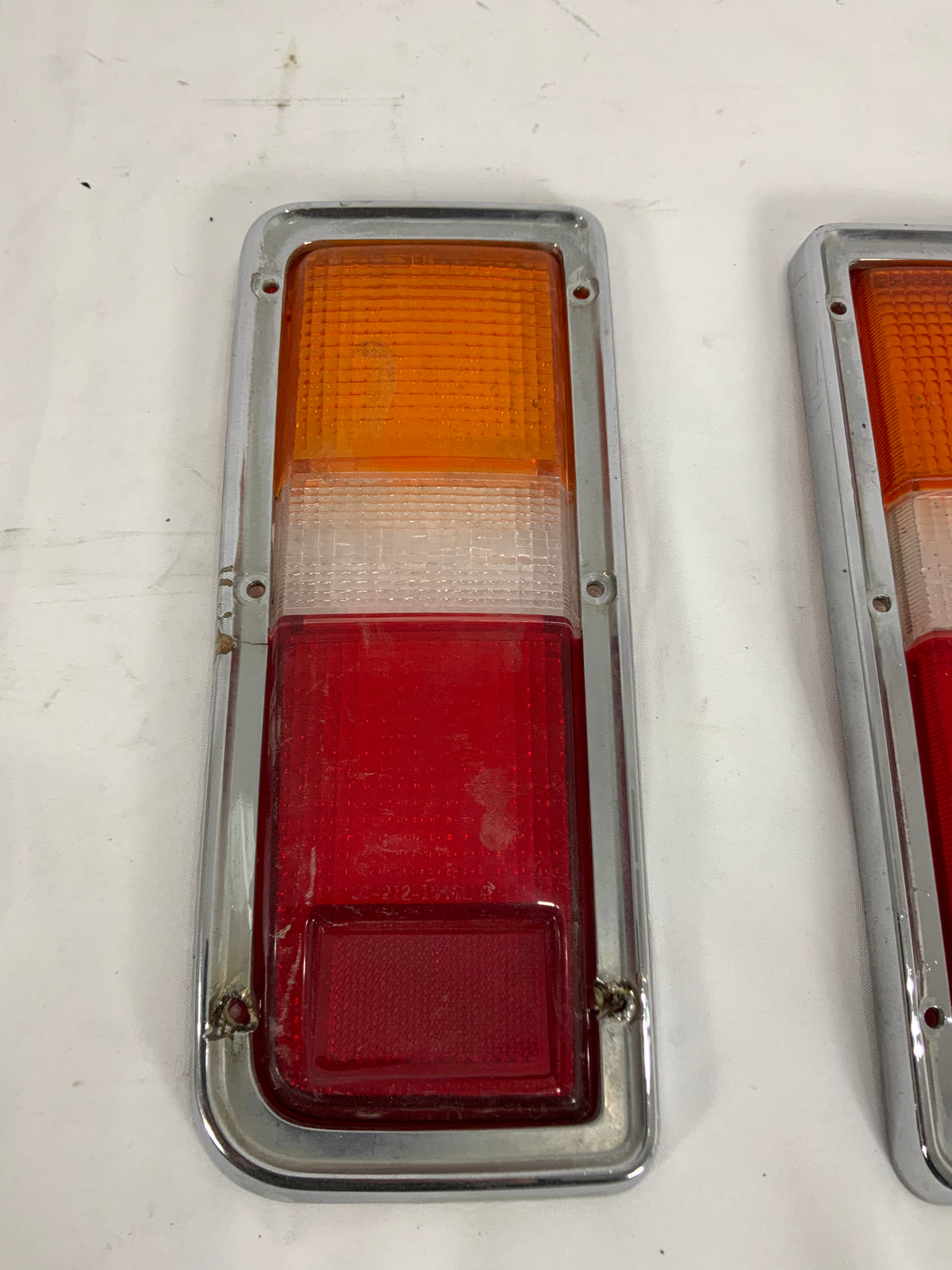 Used - Tail Light Lens and Chrome Trim Pair - FJ55 1977-1980