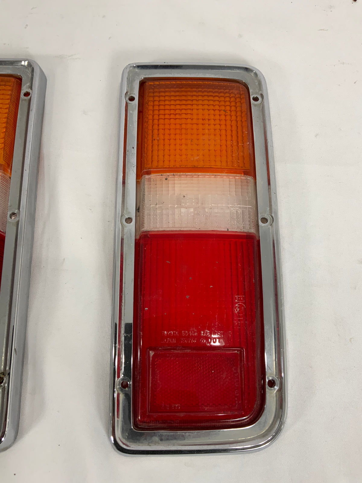 Used - Tail Light Lens and Chrome Trim Pair - FJ55 1977-1980