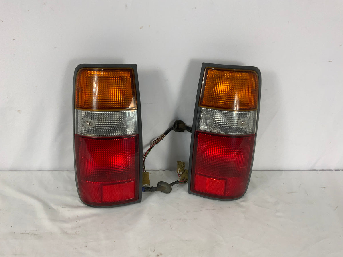 Used - Tail Light Housing Pair - FJ80 1990-1998